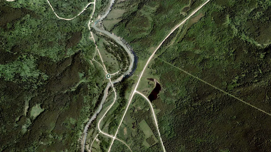 Aerial view of Castle River Bridge Campground and surroundings