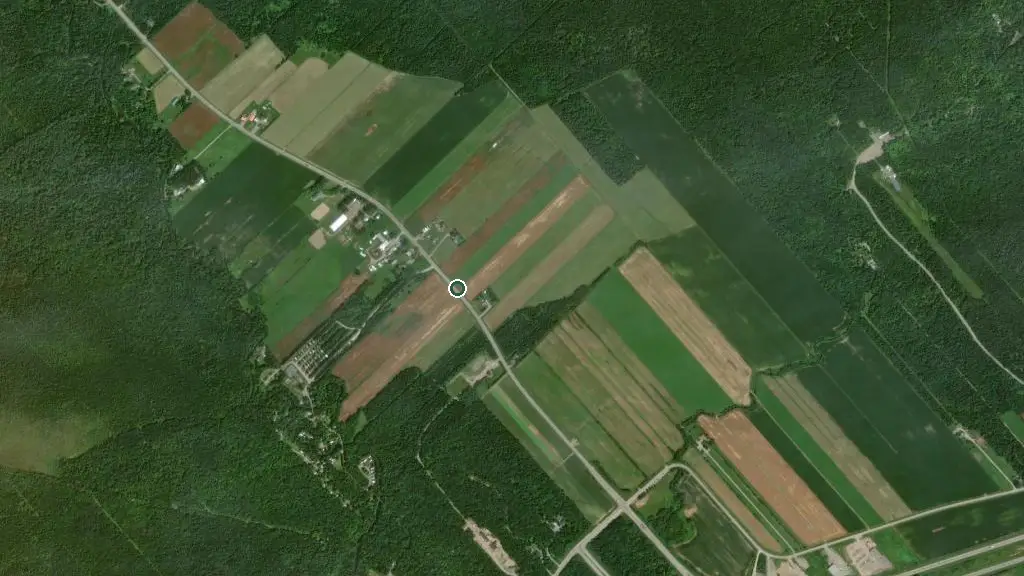 Aerial view of Camping de la Rivière aux Pommes and surroundings