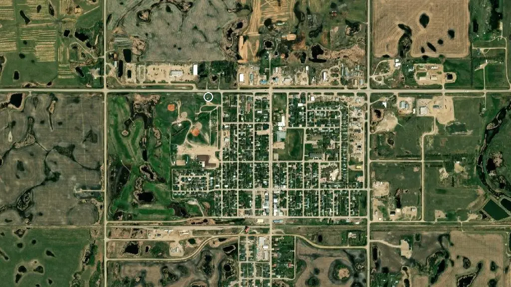 Aerial view of Redvers Tourism Log Cabin Campground and surroundings