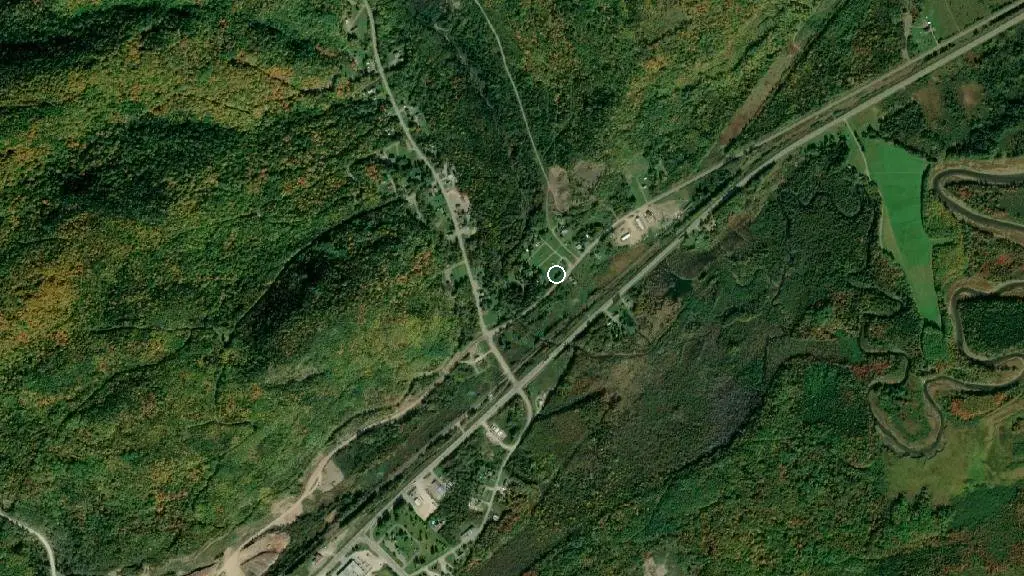 Aerial view of Camping la Maison Verte du Parc Gaspésien and surroundings