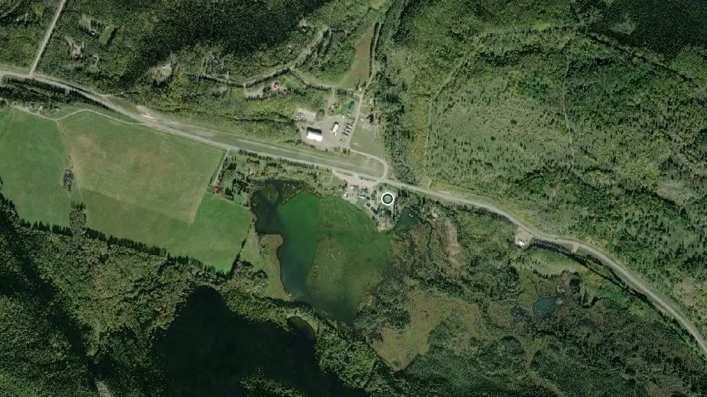 Aerial view of Toad River Lodge RV Park and surroundings