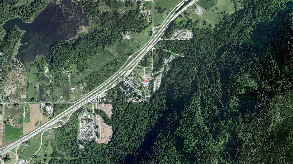 Aerial view of Camperland RV Resort & Cabins and surroundings