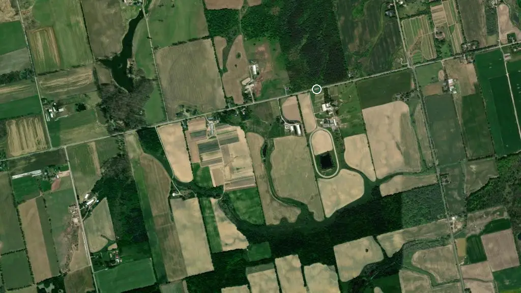 Aerial view of Olympia Village Trailer Park and surroundings