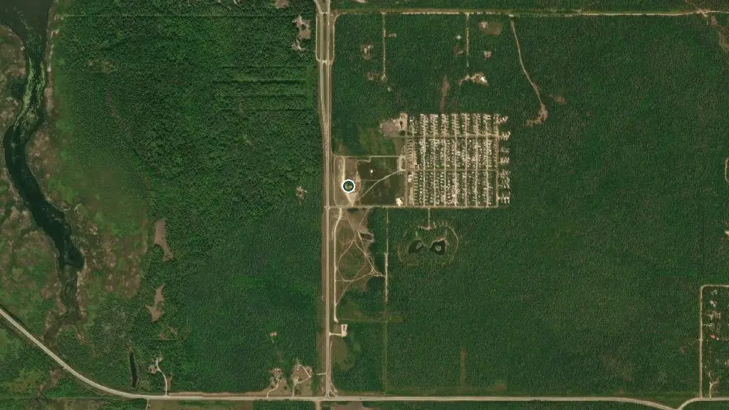 Aerial view of Grand Palms RV Resort & Park and surroundings