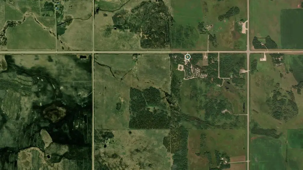 Aerial view of Sunset Oaks Family RV Park and surroundings