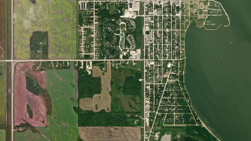 Aerial view of Autumnwood Motel & RV Resort and surroundings