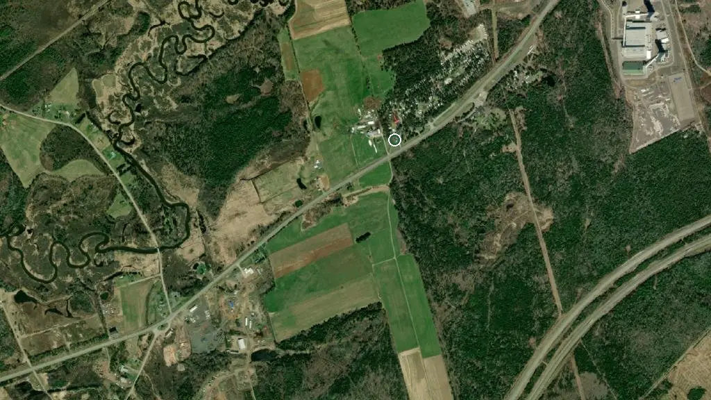 Aerial view of Pine Cone Trailer Park and surroundings
