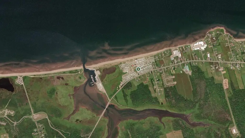 Aerial view of Sandy Beach Tent & Trailer Park and surroundings