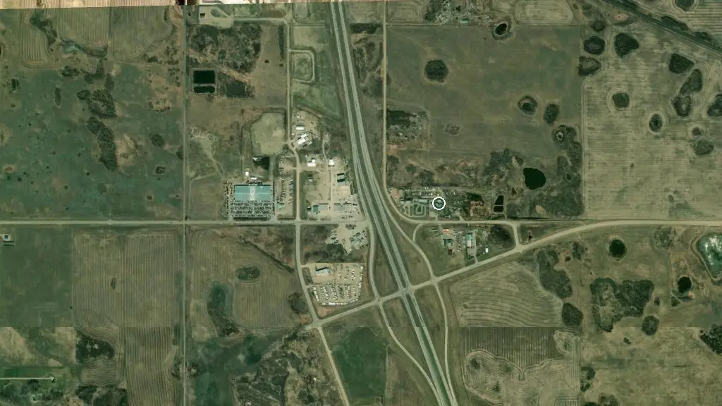 Aerial view of The Travel Inn RV Park and surroundings