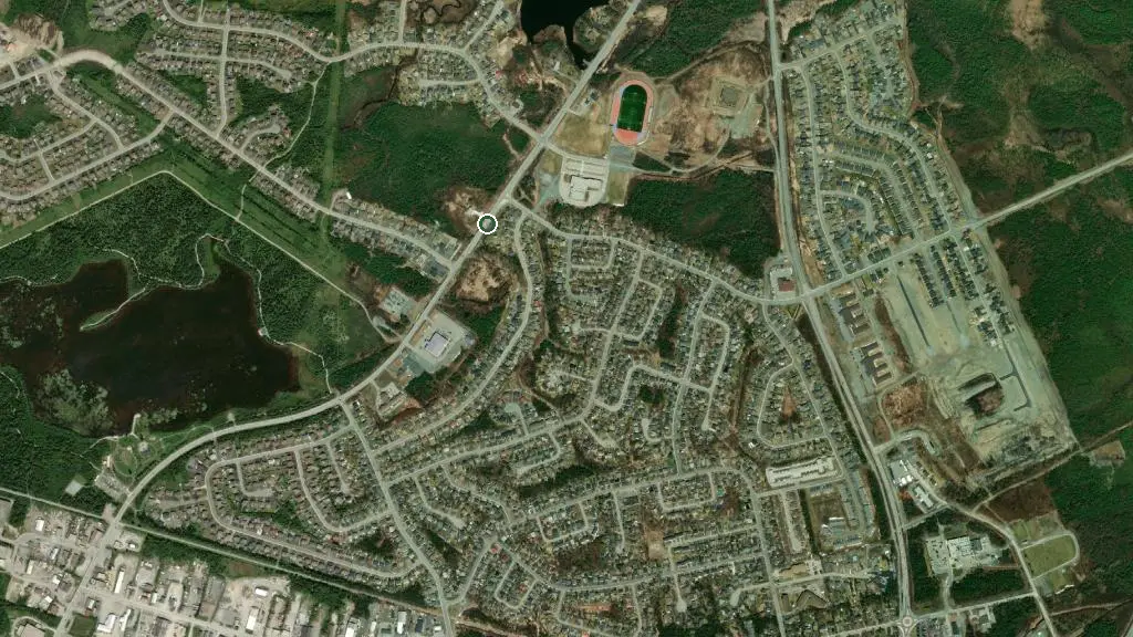 Aerial view of Country Inn Motel & RV Park and surroundings