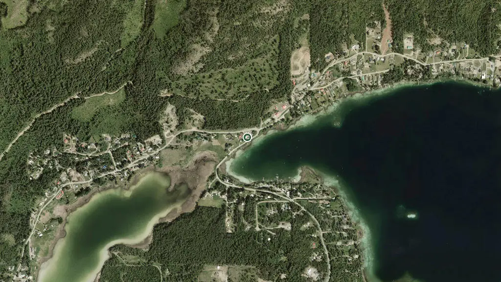 Aerial view of Serenity by the Lake RV Park and surroundings
