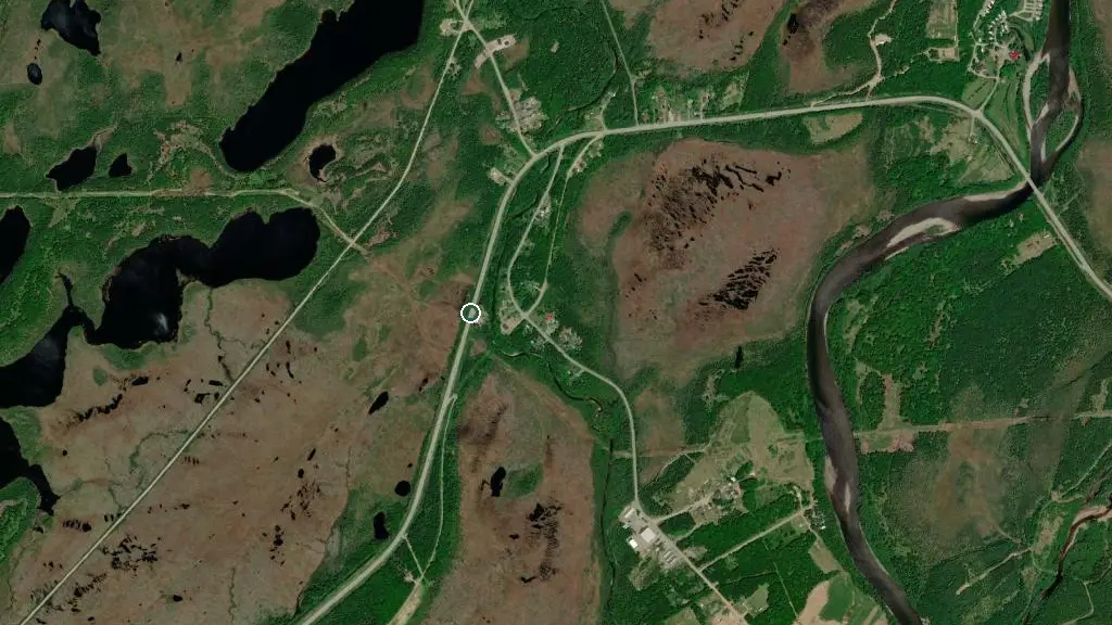 Aerial view of Dhoon Lodge and RV Resort and surroundings
