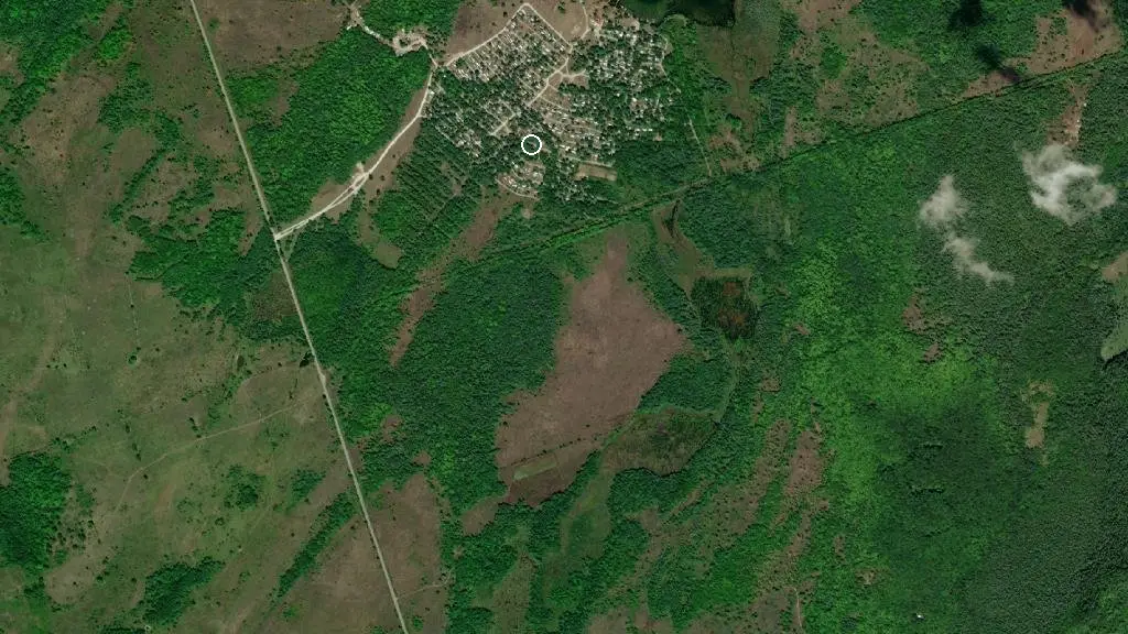 Aerial view of Camp Inn Inc and surroundings