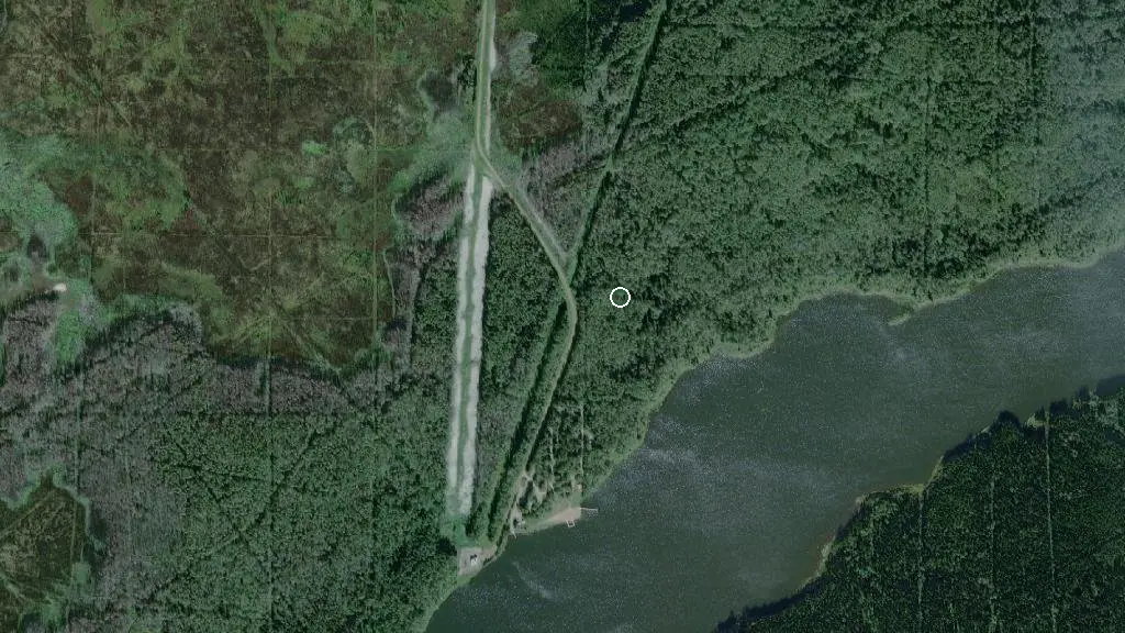 Aerial view of Rainbow Lake Provincial Recreation Area and surroundings