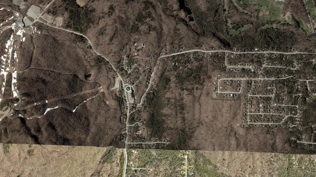 Aerial view of L'Auberge Des Quatre Saisons and surroundings